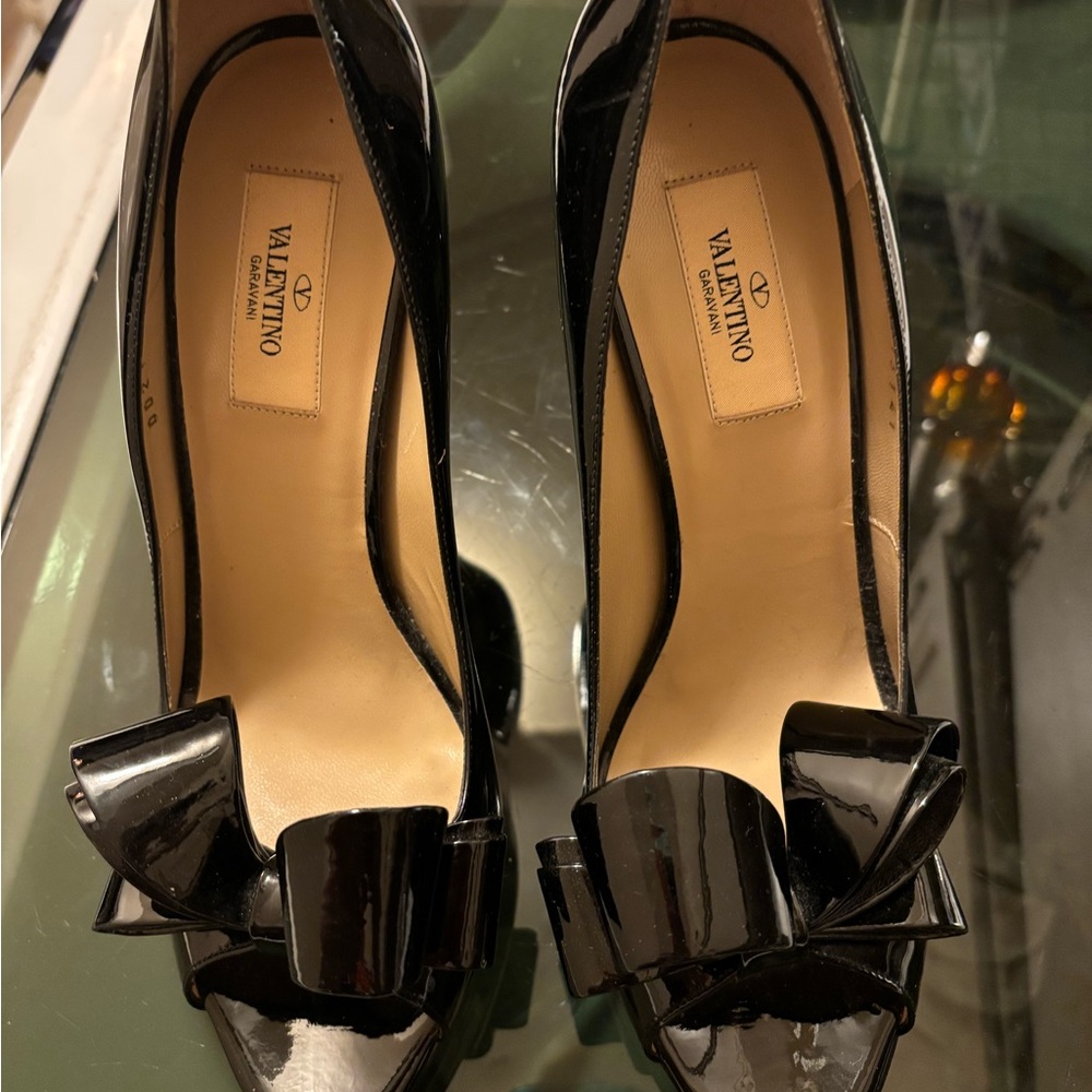 Black patent Valentino bow pump, Open toe.  In great condition!  Size 40.